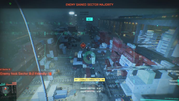 A drone identifies adversaries while soaring over a target in Battlefield 2042. Torrential rain envelops the drone, and the HUD indicates that the enemy has taken control of a sector.